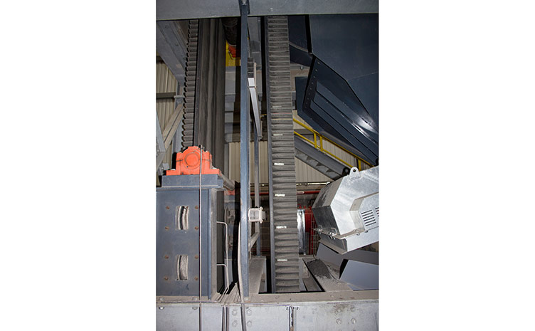 Flexowell vertical conveyor belt reaching mine surface