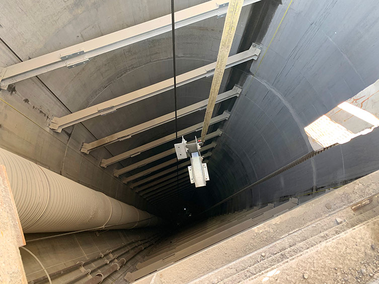 vertical mine shaft bunton steel sets being installed